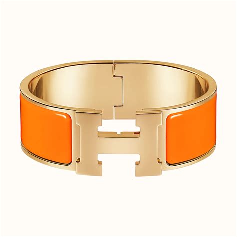 Bracciali Hermès in metallo Arancione .